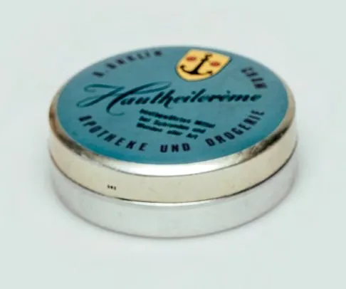 Tin of the skin cream with the inscription Hautheilcreme, A. Anklin Cham