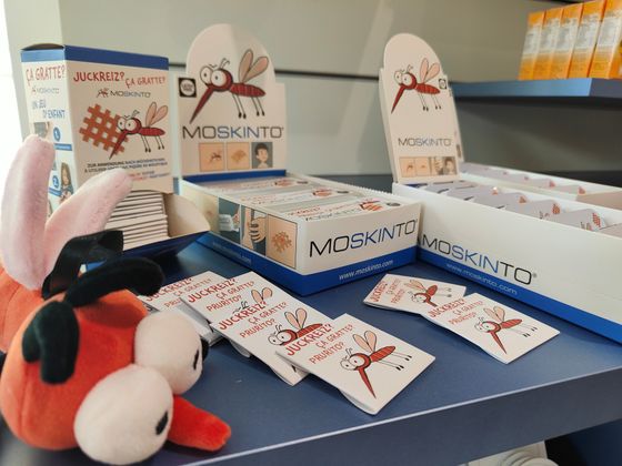 Display of plasters for insect bites on the consulting table of Anklin Apotheke